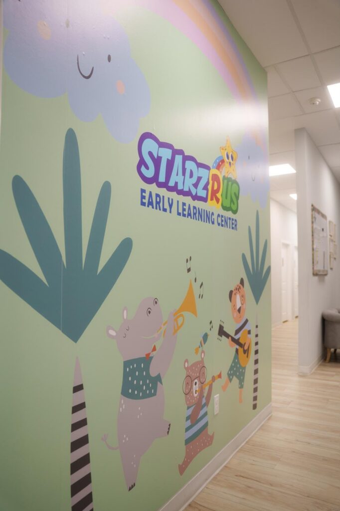 Colorful child-friendly mural inside Starz R Us