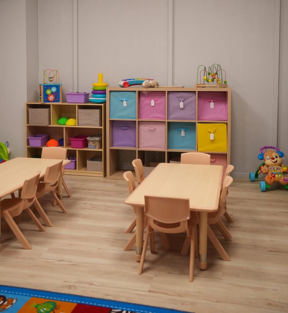 Child-sized tables and organized learning materials at Starz R Us